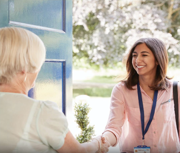 ISP rep speaking to a homeowner about fiber internet.