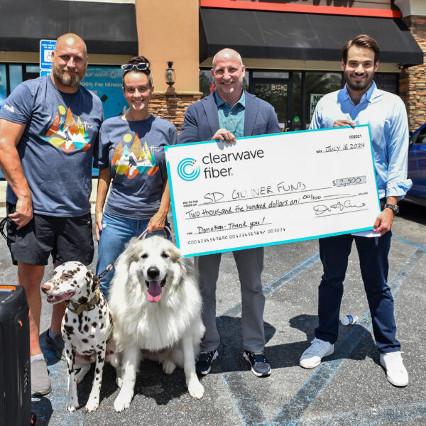 From left, OIF US Army Disabled Veteran and Purple Heart Recipient SGT Hamilton Kinard, founder & CEO of SD Gunner Fund Britnee Kinard, Clearwave Fiber CEO David Armistead and Clearwave Fiber President Charles Lawrence.
