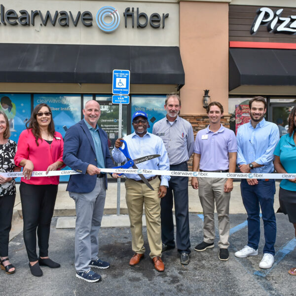 From left, Liberty Chamber Board Members Barbara Martin with GeoVista and Charlotte Martin with Yates Astro, Clearwave Fiber CEO David Armistead, Hinesville Mayor Karl Riles, Liberty Chamber Board Member Jimmy Shanken with Coldwell Banker, U.S. Rep. Buddy Carter’s Regional Director Matthew Wirth, Clearwave Fiber President Chip Lawrence, and Liberty County Chamber of Commerce Board Member Dr. Karen Bell with Keep Liberty Beautiful.